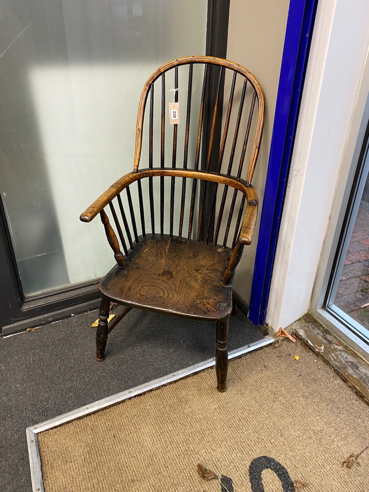 A mid 19th century ash, elm and beech Windsor comb back armchair, cut down, width 50cm, depth 40cm, height 99cm